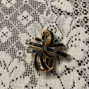 Elegant Gold and Blue Knot Brooch